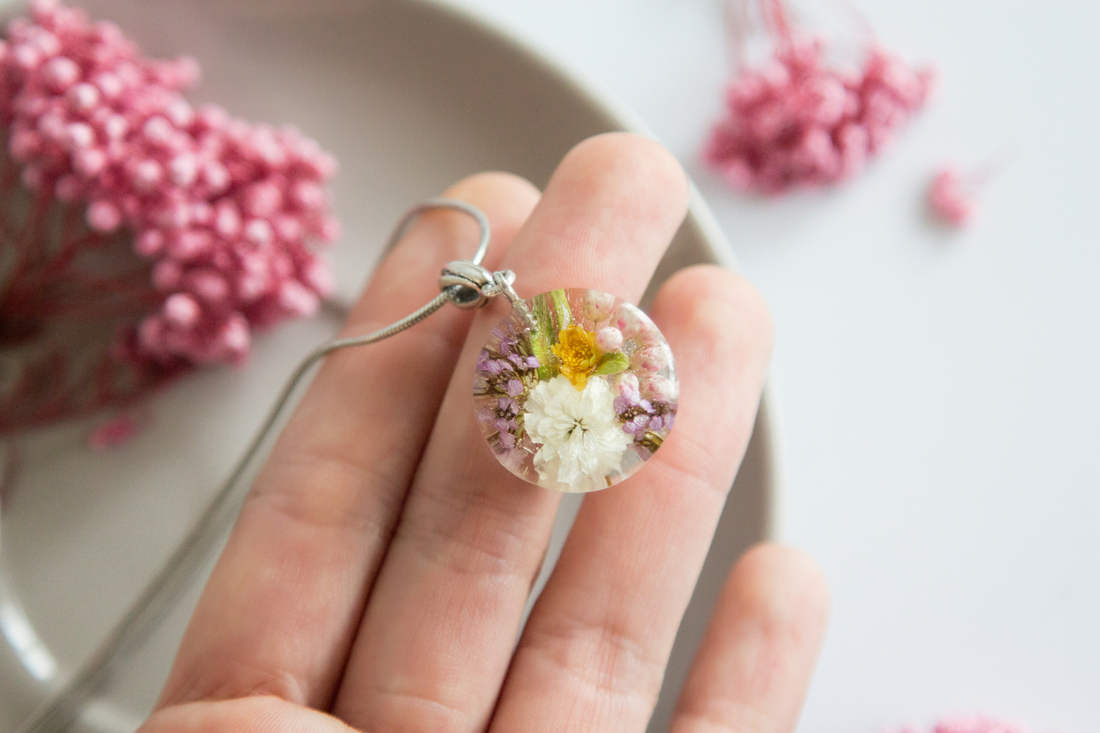 Real flowers in epoxy resin, jewelry